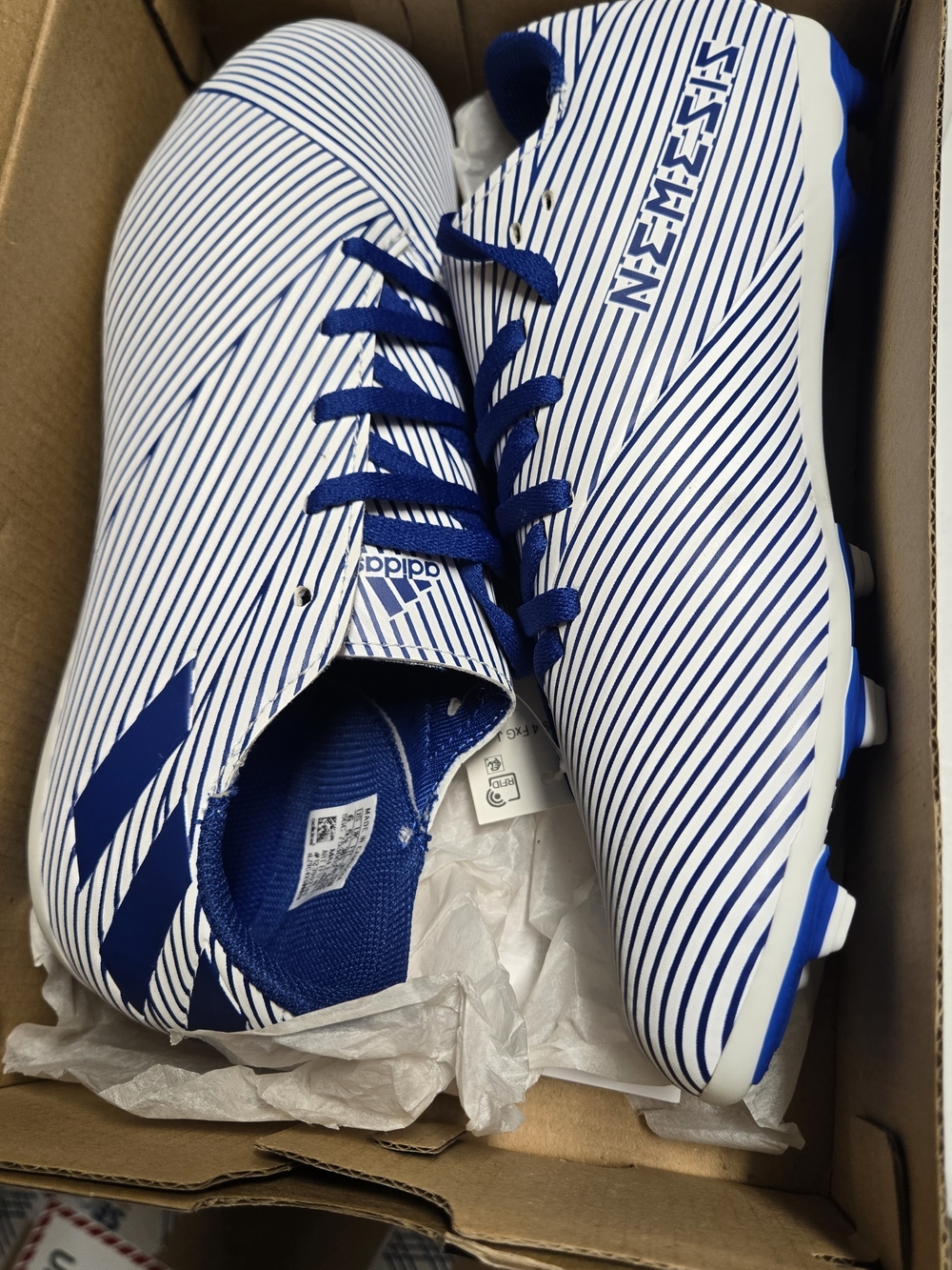 adidas Nemeziz 19.4 FxG J Soccer Cleats in White & Royal Blue